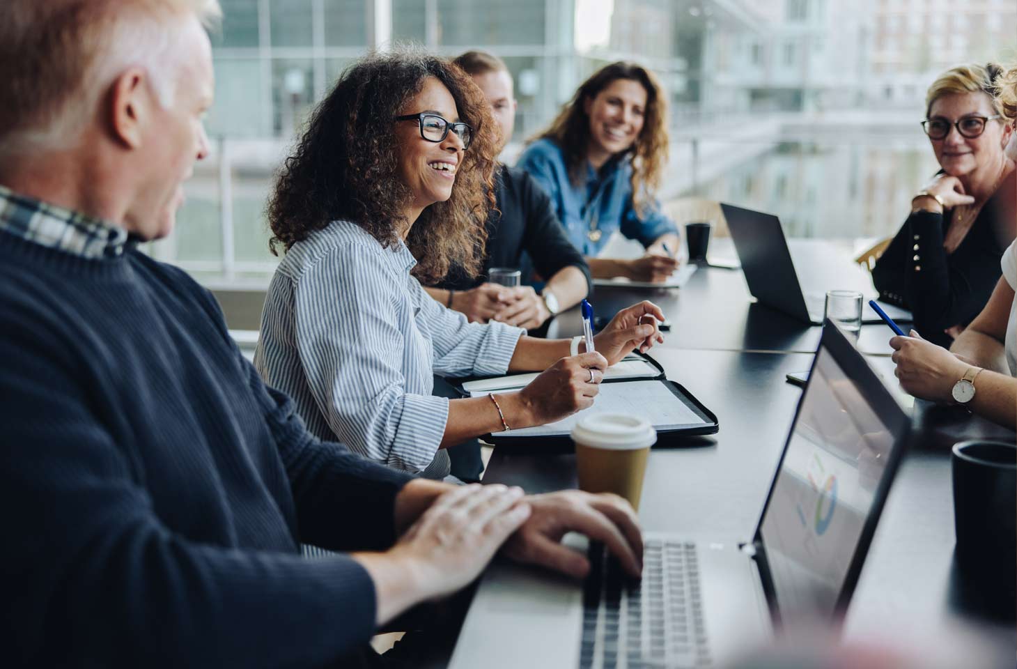 Woman is discussing about data quality with her team